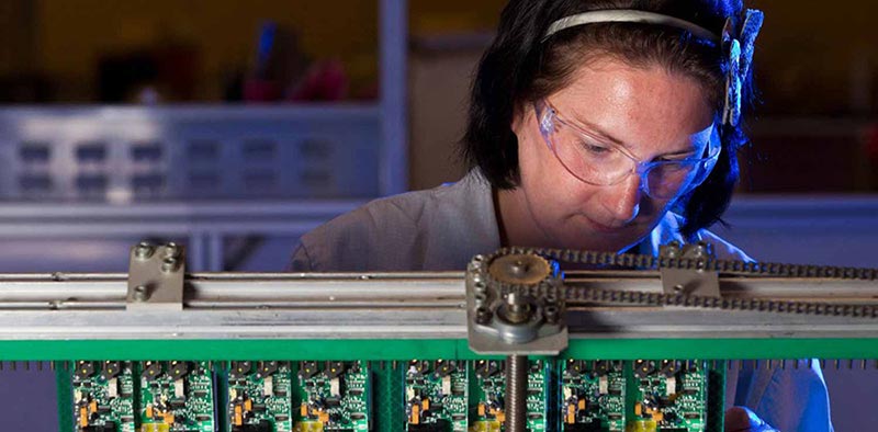 Engineer assembling precision components